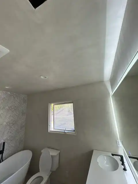 Master bathroom, level-5 finish, primer and Venetian plaster application 2026 project photo